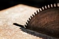 Close-up picture of a rusty circular saw in an old sawmill