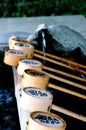 Close up picture of some Bamboo ladles at Izanagi Shrine, Japan Royalty Free Stock Photo