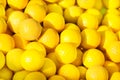 Close-up picture of yellow golf balls pile