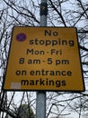 Close up picture of no stopping sign mon - fri