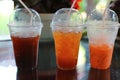 Close-up pictures of drinks, nectar, coffee and cold milk tea with a glass on the table Royalty Free Stock Photo