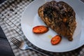 A large piece of baked meat Still life on a light wooden table Royalty Free Stock Photo