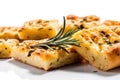 A close up of a piece of bread with a sprig of rosemary. Generative AI image.