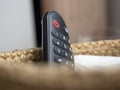 Close-up of a piece of plastic remote control for the TV. Selective Focus