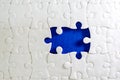 Close up piece of the white jigsaw puzzle , concept of business Royalty Free Stock Photo