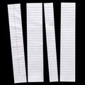 Close up piece of white lined paper isolated on black Royalty Free Stock Photo