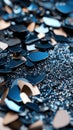 A close up of a pile of black and blue confetti Royalty Free Stock Photo