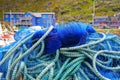 Close up of a pile of blue fishing nets and ropes, Kamoyfjord Village, Mageroya Island, Finnmark Royalty Free Stock Photo