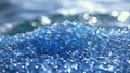 A close up of a pile of blue water beads, AI