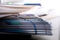 Close-up of a pile of books and magazines on a table Royalty Free Stock Photo