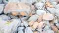 Close up of pile of broken red bricks, fragments of tiles and concrete Royalty Free Stock Photo