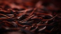 A close up of a pile of brown and black swirls, AI