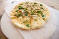 Close up pile of Caucasian khychin bread pie with stuffing