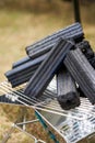 Close up of a pile of charcoal piles for camping outdoors