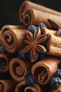 A close up of a pile of cinnamon sticks and star anise pods