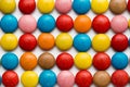 Close up of a pile of colorful chocolate coated candy, chocolate pattern, chocolate background. Royalty Free Stock Photo