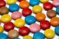 Close up of a pile of colorful chocolate coated candy, chocolate pattern, chocolate background. Royalty Free Stock Photo