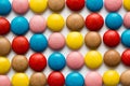 Close up of a pile of colorful chocolate coated candy, chocolate pattern, chocolate background. Royalty Free Stock Photo