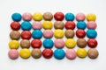 Close up of a pile of colorful chocolate coated candy, chocolate pattern, chocolate background. Royalty Free Stock Photo