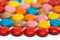 Close up of a pile of colorful chocolate coated candy, chocolate pattern, chocolate background. Royalty Free Stock Photo