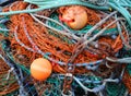 Close Up Pile of Colorful Fish Nets and Buoys Royalty Free Stock Photo