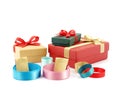 group of colorful roll ribbons with golden paper label and three color gift boxes tied bow Royalty Free Stock Photo