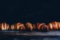 Close Up Of Pile Of Delicious Croissants On A Dark Background. Homemade Croissants. Neural Network AI Generated