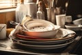 Close-up of a pile of dirty dishes after a meal in the kitchen