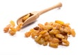 Close-up of pile dried, raw jumbo sized golden raisins in a wood Royalty Free Stock Photo
