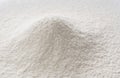 Close-up of a pile of flour being sifted