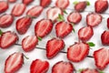 Close-up pile of fresh chopped strawberries on white background. Heap, many of organic ripe sliced strawberry Royalty Free Stock Photo