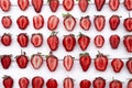 Close-up pile of fresh chopped strawberries on white background. Heap, many of organic ripe sliced strawberry Royalty Free Stock Photo