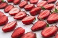 Close-up pile of fresh chopped strawberries on white background. Heap, many of organic ripe sliced strawberry, healthy fruit food Royalty Free Stock Photo