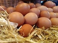 Close-up pile of fresh hen eggs on straw Royalty Free Stock Photo