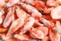 Close-up of a pile of frozen shrimps. No cleaned shrimp. Seafood background.