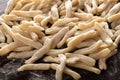 Close up of a pile of handmade caserecce pasta