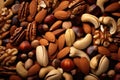 close-up of a pile of mixed nuts: almonds, cashews, walnuts