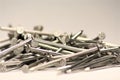 Pile of Nails lying on the Ground Royalty Free Stock Photo
