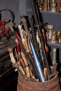 Close-up of a pile of old tools in a thrift store