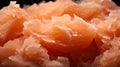 A close up of a pile of orange and pink ice