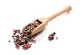 Close-up of pile of pepper seeds mix spice in a wooden spoon on