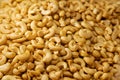 Close up pile of Roasted cashew nuts texture and background