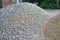 Pile rocks and sand on the ground ,prepare for building a house