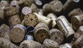 Close up of a pile of several wine corks with cultivar and winery details