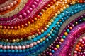 Close up of a pile of shiny colorful beads. Generative AI Royalty Free Stock Photo