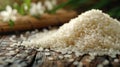 A close-up of a pile of white rice grains on a wooden surface Royalty Free Stock Photo