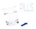 Close up of pill and water