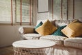 Close up pillow on sofa at home in morning with sunlight.Furniture in house background with light shade on object