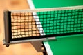 Close up ping pong net and line - green table Royalty Free Stock Photo