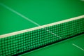 Close up ping pong net and line - green table Royalty Free Stock Photo